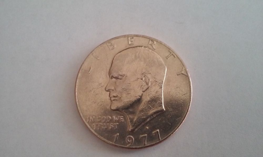 Help!-1977-D-Ike-Dollar-With-Smooth-Edge